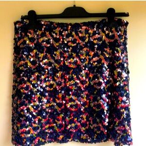 Urban Outfitters Glitter! Sequins! mini-skirt with flattering side slit.